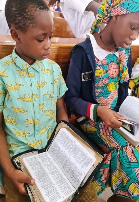 Teenagers reading Scripture